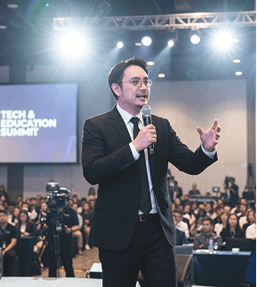 Dan Giang addressing the Tech & Education Summit